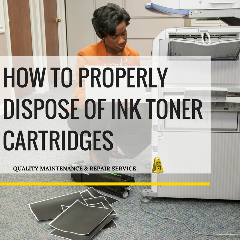 Woman kneeling at copier changing ink toner cartridge